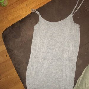 Spaghetti strap under shirt. Never worn.